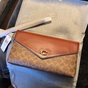 Coach Signature Brown and Tan Clutch